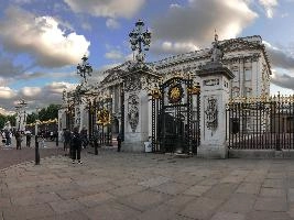 Buckingham Palace in London, viewed through railings, royal, grand, barred, railings, palace, buckingham, london, summer, britain, monarchy, england, tourism, europe, protected